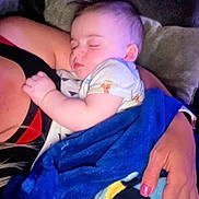 Skyler joined the competition — help win amazing prizes! baby, sleeping, blanket, blue_blanket, hand, nails, pink_nails, person, arm, couch, pillow, indoor, closeup, child, infant, rest, comfort, cozy, toddler, skin