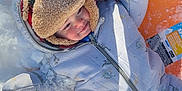 Skyler joined the competition — help win amazing prizes! child, toddler, snow, sled, winter, snowsuit, hat, cozy, smile, outdoor, play, cold, fun, orange, snowy, person, clothing, happy, frozen, recreation