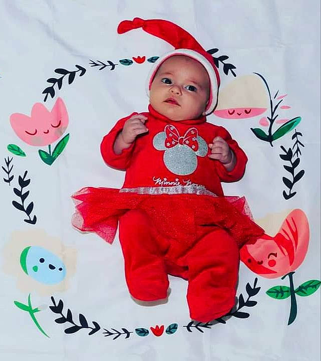 Anastasia participe au concours pour gagner de l'argent avec cette photo : baby, baby_toddler_clothing, carmine, child, christmas_eve, design, event, fictional_character, font, happy, headwear, holiday, pattern, person, pink, product, red, sleeve, sugar_cake, t_shirt