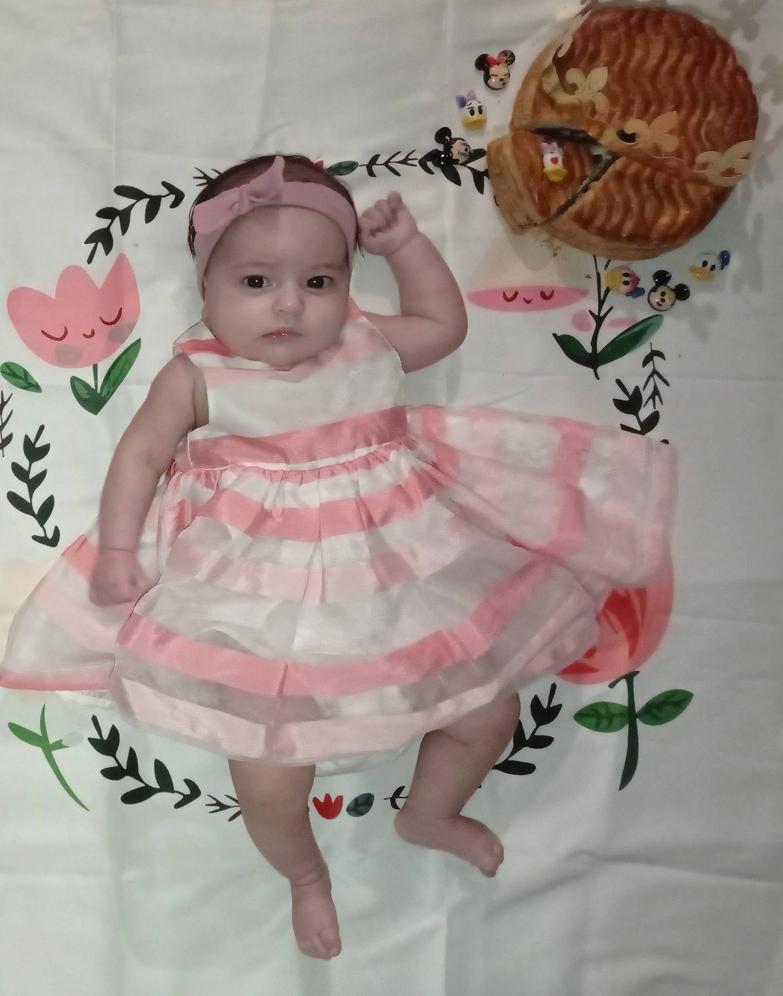 Anastasia participe au concours pour gagner de l'argent avec cette photo : baby, baby_products, baby_toddler_clothing, child, day_dress, doll, dress, embellishment, eyelash, fashion_accessory, headpiece, headwear, linens, magenta, mythical_creature, one_piece_garment, pattern, peach, person, pink