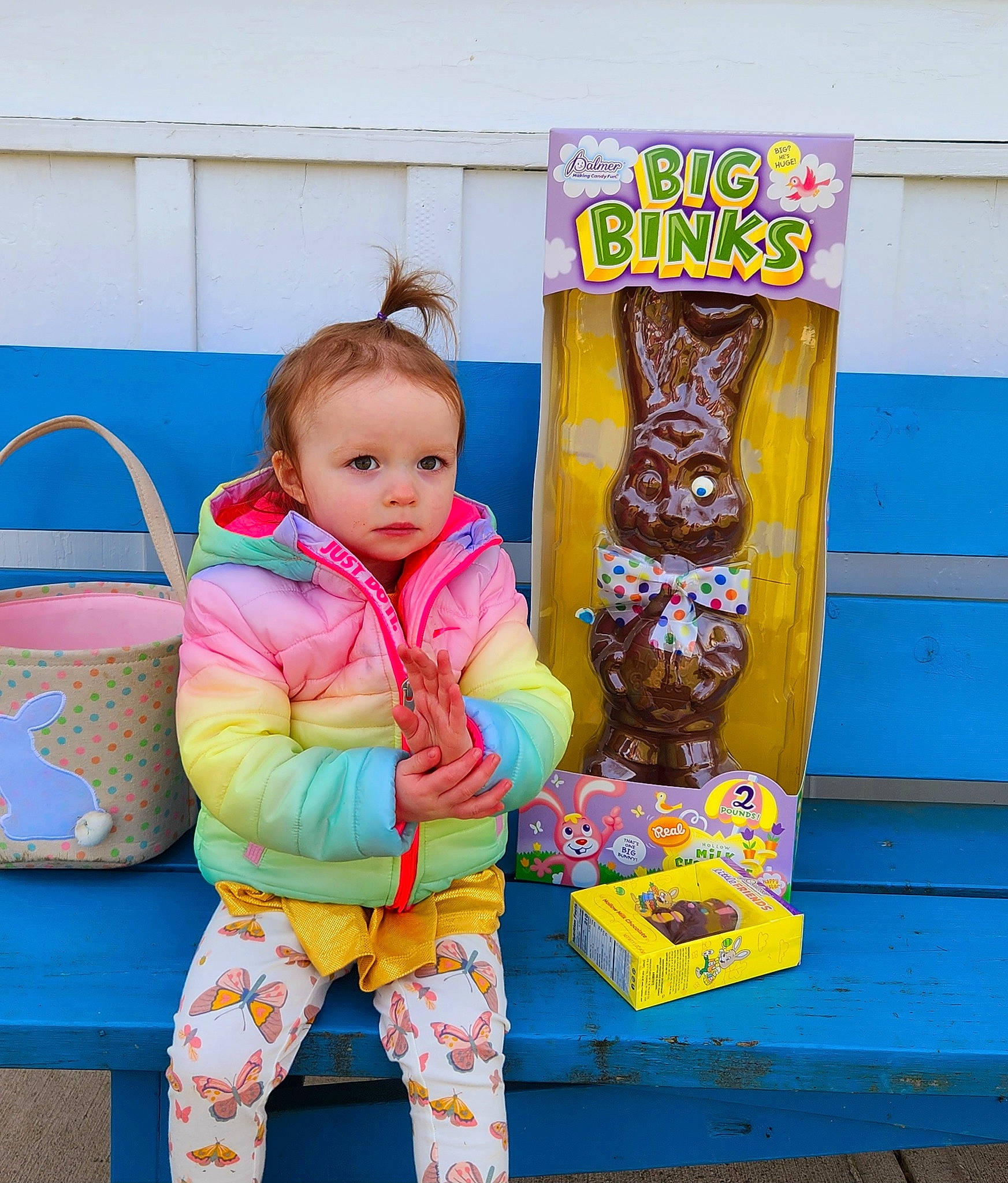 Adley is registered to the contest to win money with this photo: baby, baby_toddler_clothing, bag, blue, child, fun, happy, machine, magenta, nightwear, pajamas, pattern, person, room, sitting, sleeve, stuffed_toy, toddler, toy