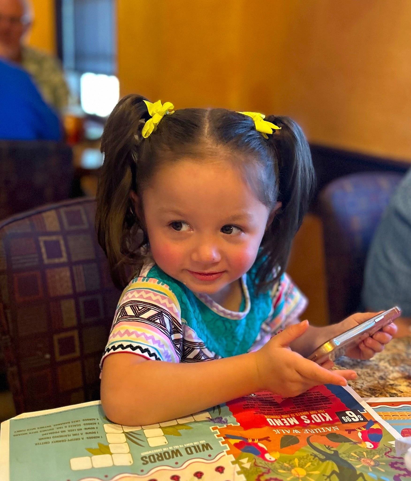 Astrid joined the competition — help win amazing prizes! adaptation, audio_equipment, baby, blurred, book, chair, child, event, fun, happy, learning, leisure, person, play, reading, recreation, room, sharing, sitting, smile