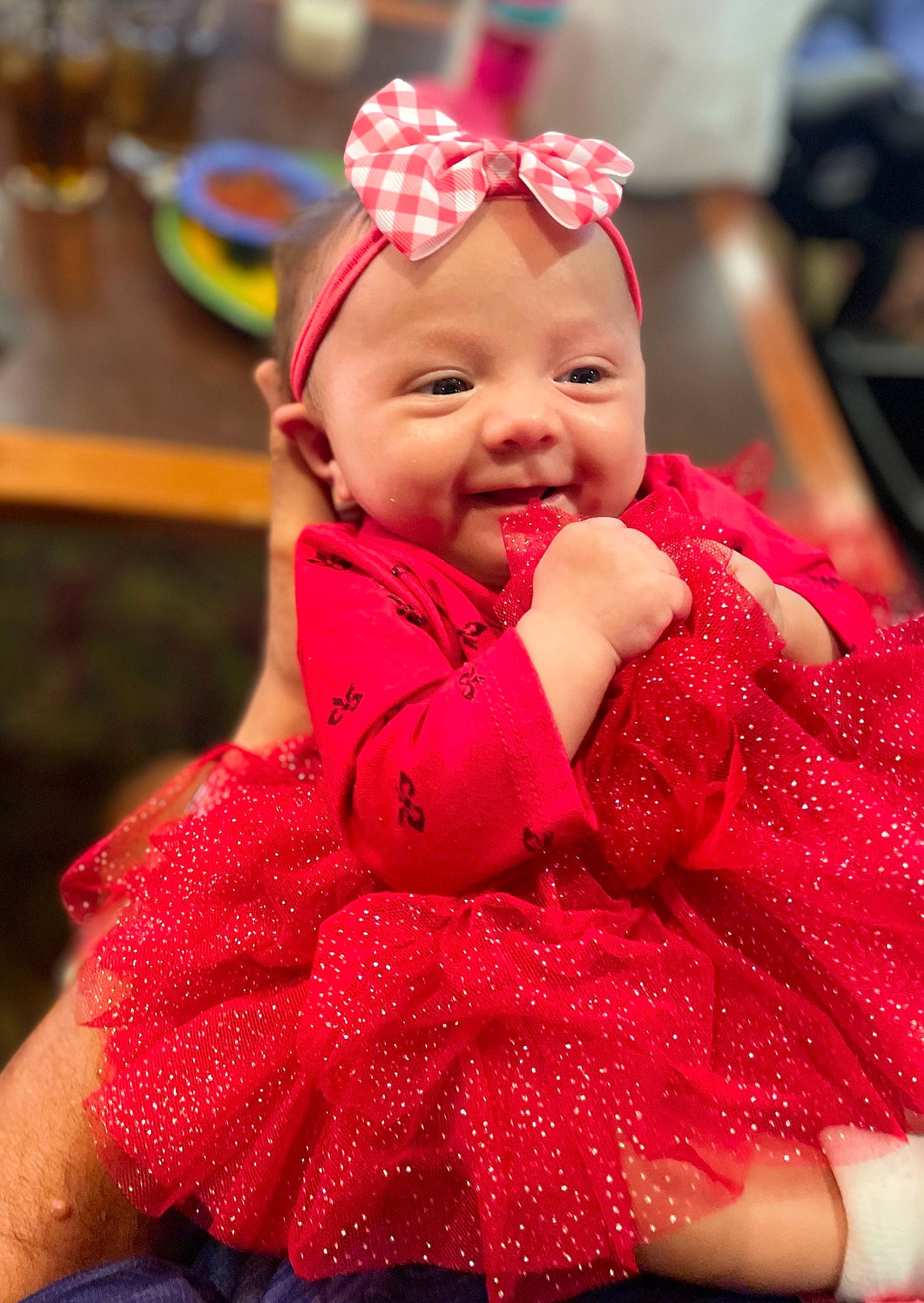 Athena joined the competition — help win amazing prizes! baby, baby_laughing, baby_toddler_clothing, child, costume_hat, event, fashion_accessory, fun, hair_accessory, happy, head, headwear, magenta, pattern, person, pink, red, skin, sleeve, smile