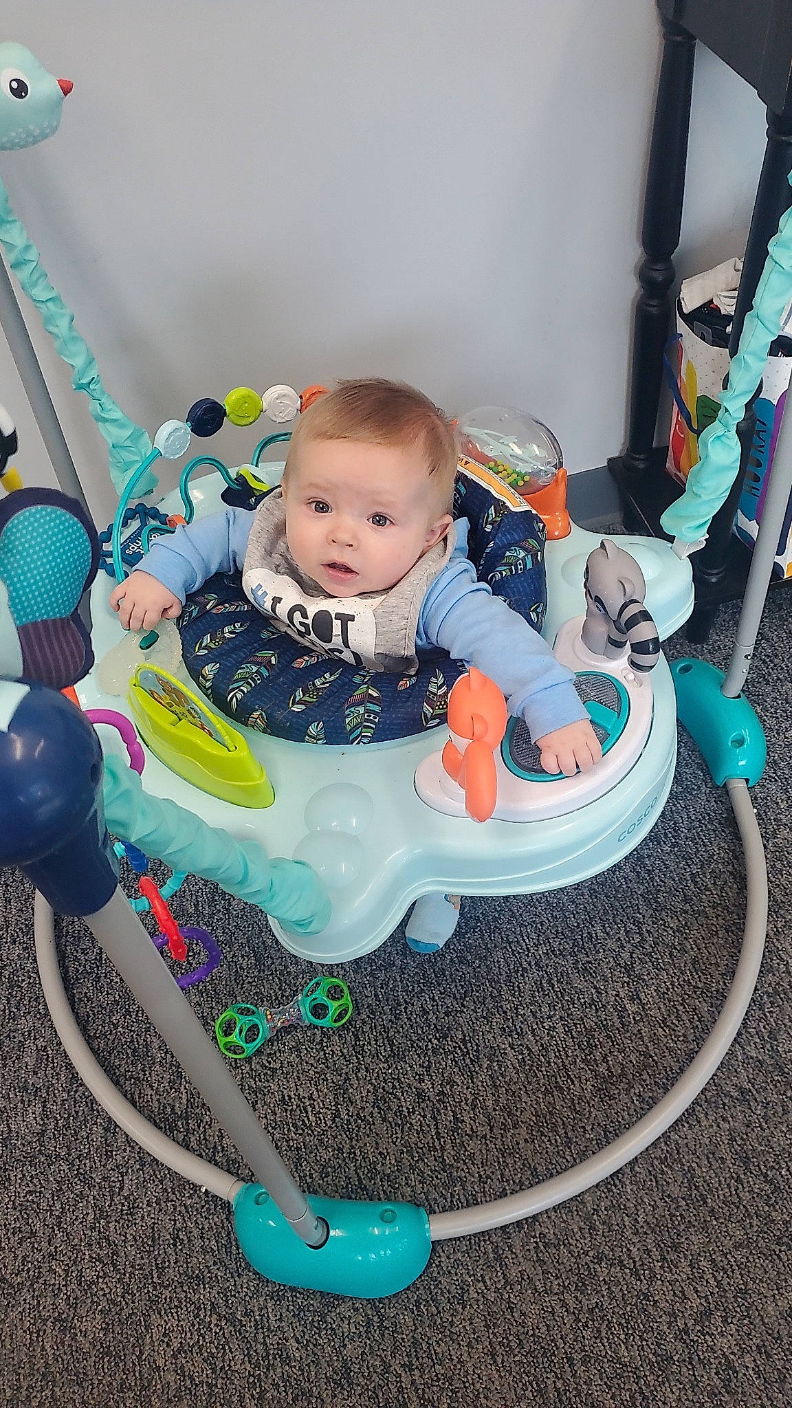 Curtis is registered to the contest to win money with this photo: baby, baby_carriage, baby_products, baby_safety, baby_toddler_clothing, baby_toys, chair, child, circle, comfort, electric_blue, fun, grass, leisure, people, person, play, product, sitting, toddler