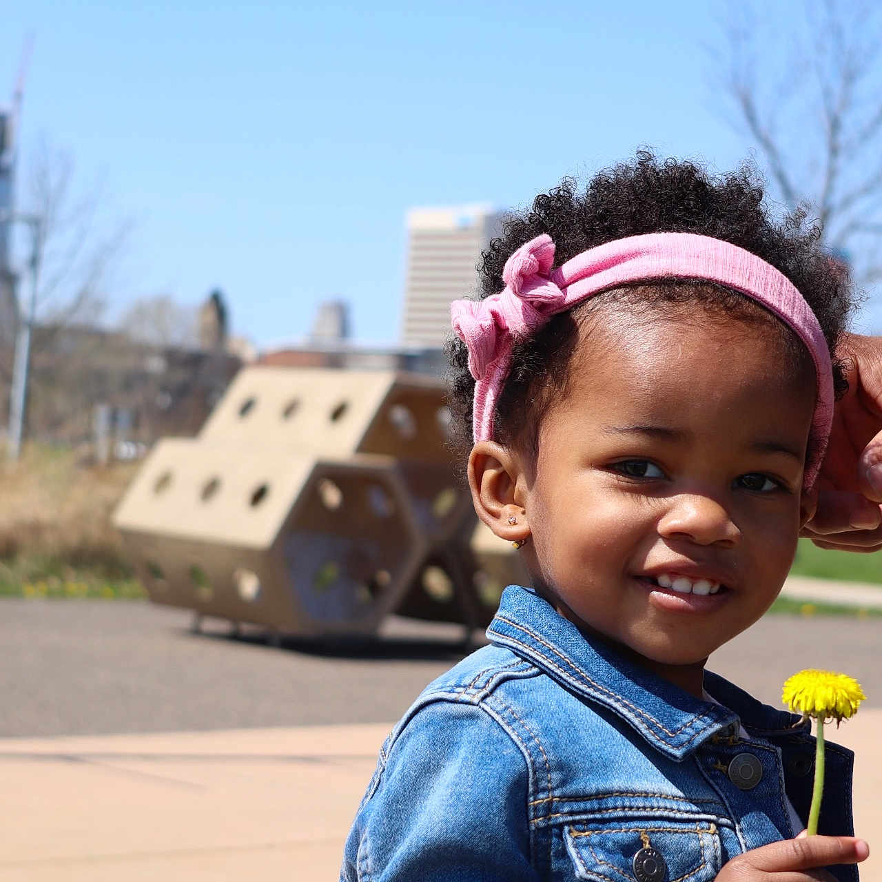 Kaiya is registered to the contest to win money with this photo: accessories, baby, bodypart, clothing, coat, face, finger, flower, flowerarrangement, hand, happy, head, jacket, jeans, pants, person, photography, plant, portrait, smile