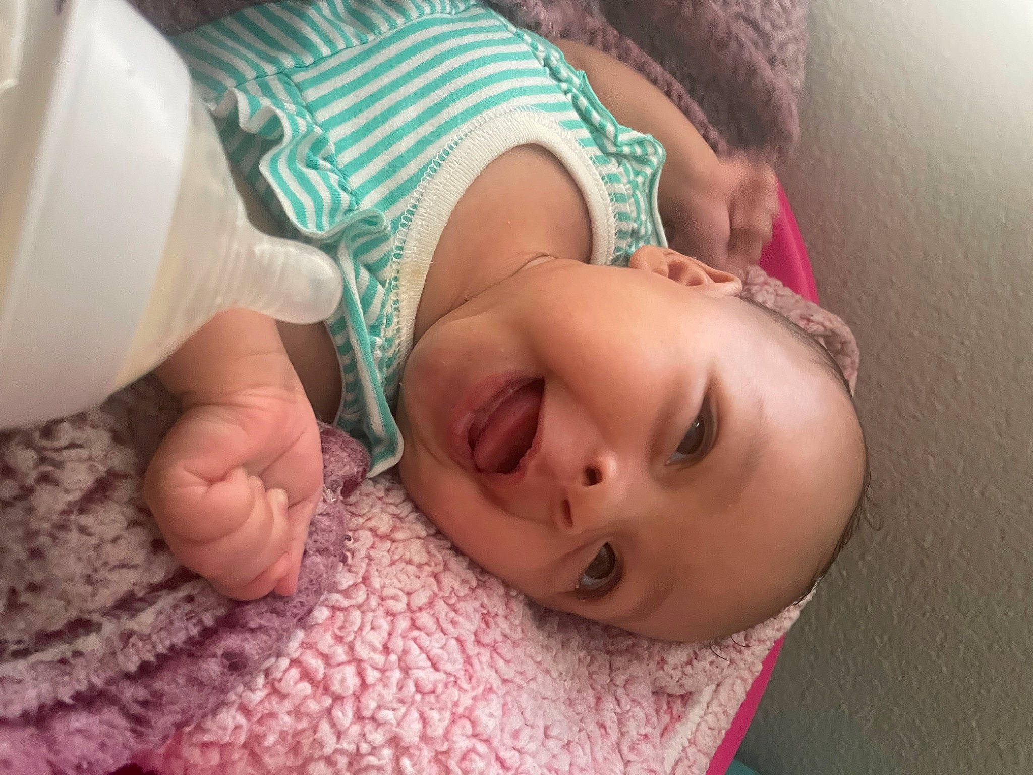 Melody is registered to the contest to win money with this photo: baby, baby_toddler_clothing, cheek, child, comfort, eyebrow, eyelash, finger, hair, hand, happy, head, human_body, lip, mouth, neck, nose, person, pink, skin