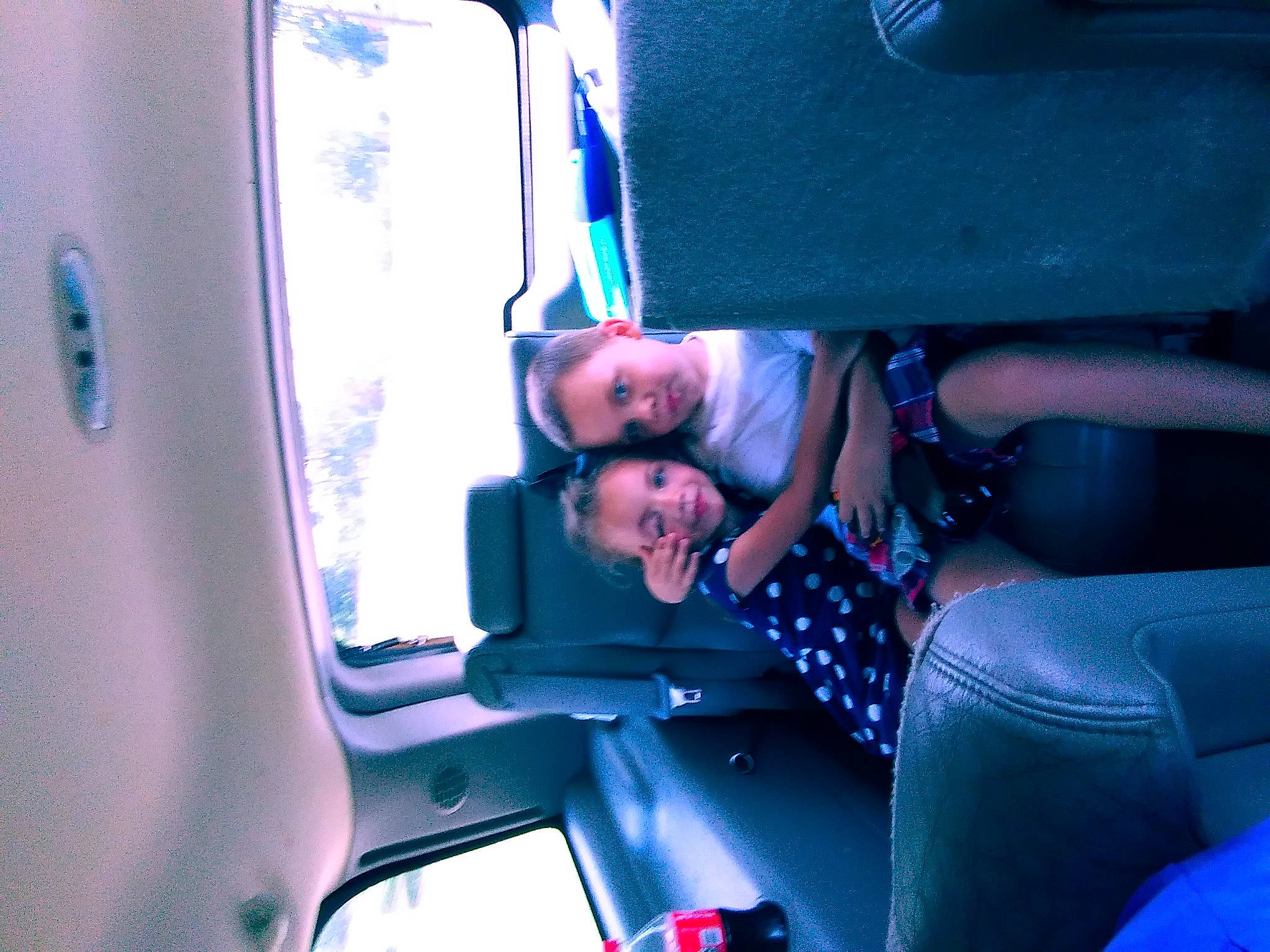 Kamden is registered to the contest to win money with this photo: air_travel, auto_part, automotive_design, automotive_exterior, automotive_lighting, blue, electric_blue, fun, human_leg, leisure, luxury_vehicle, machine, magenta, motor_vehicle, passenger, person, public_transport, purple, smile, vacation