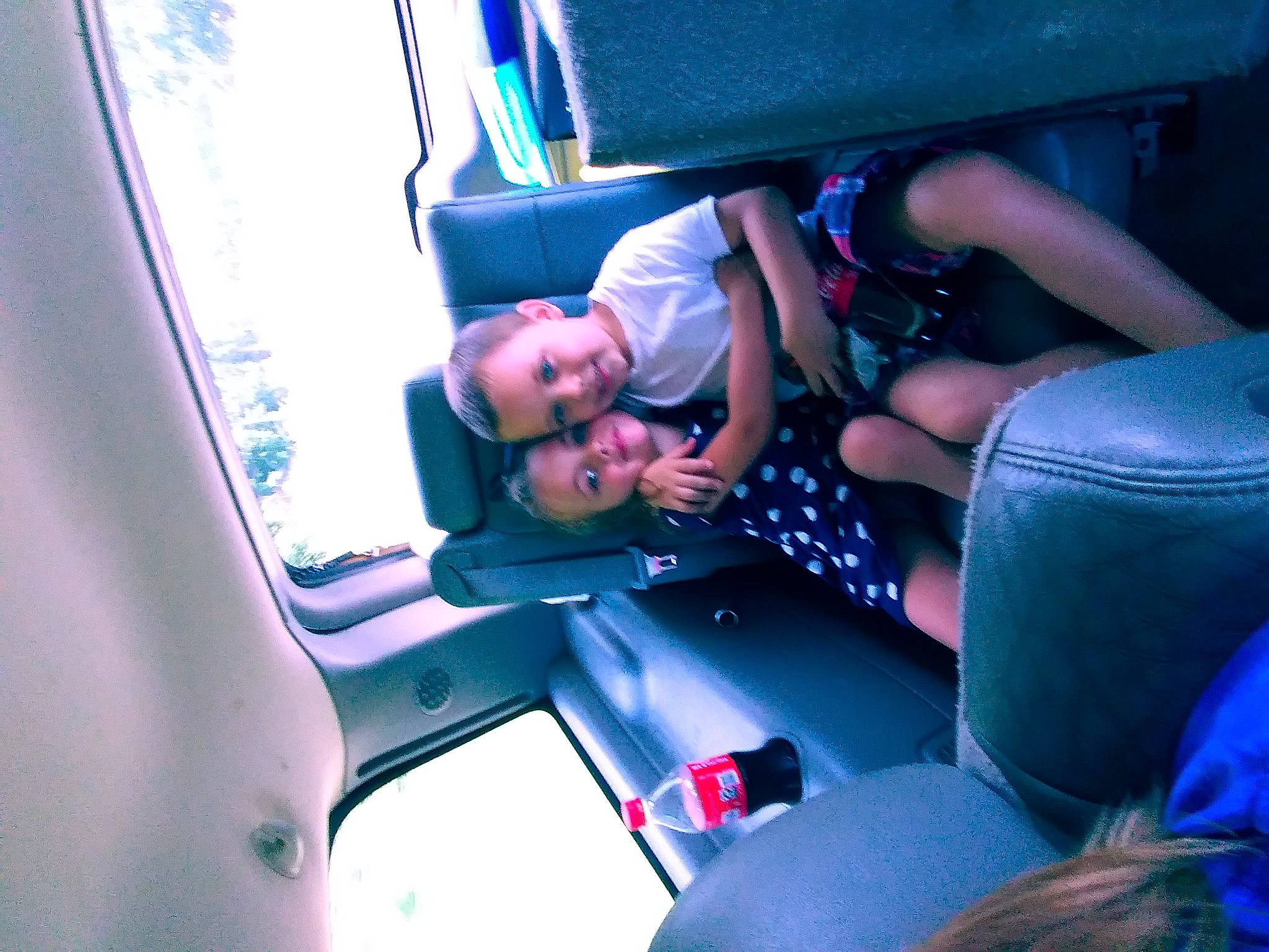 Kamden joined the competition — help win amazing prizes! air_travel, auto_part, automotive_design, automotive_exterior, car_seat, dress, hand, head_restraint, joy, leg, leisure, motor_vehicle, passenger, person, plant, public_transport, smile, sunglasses, tree, vehicle