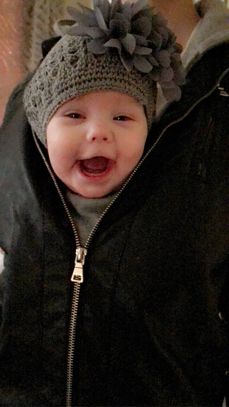 Macy joined the competition — help win amazing prizes! baby, beanie, bonnet, cheek, child, eye, face, facial_expression, fashion_accessory, fur, hat, head, headgear, knit_cap, laugh, nose, outerwear, person, skin, smile