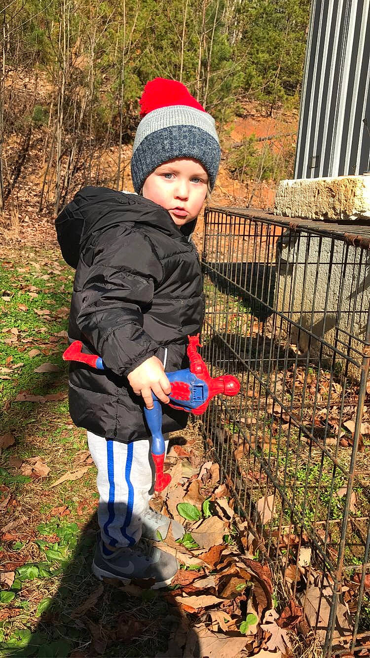 Kolt is registered to the contest to win money with this photo: beanie, cap, child, headwear, person, play, toddler