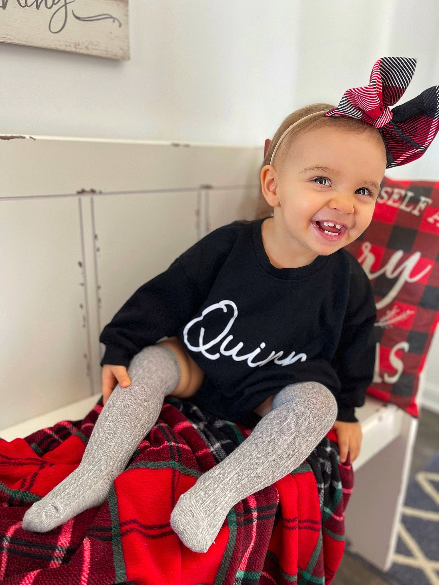 Quinn joined the competition — help win amazing prizes! cap, costume_hat, fashion_design, fun, happy, headband, human_body, human_leg, joy, knee, pattern, person, plaid, red, sleeve, smile, sock, sportswear, tartan, textile
