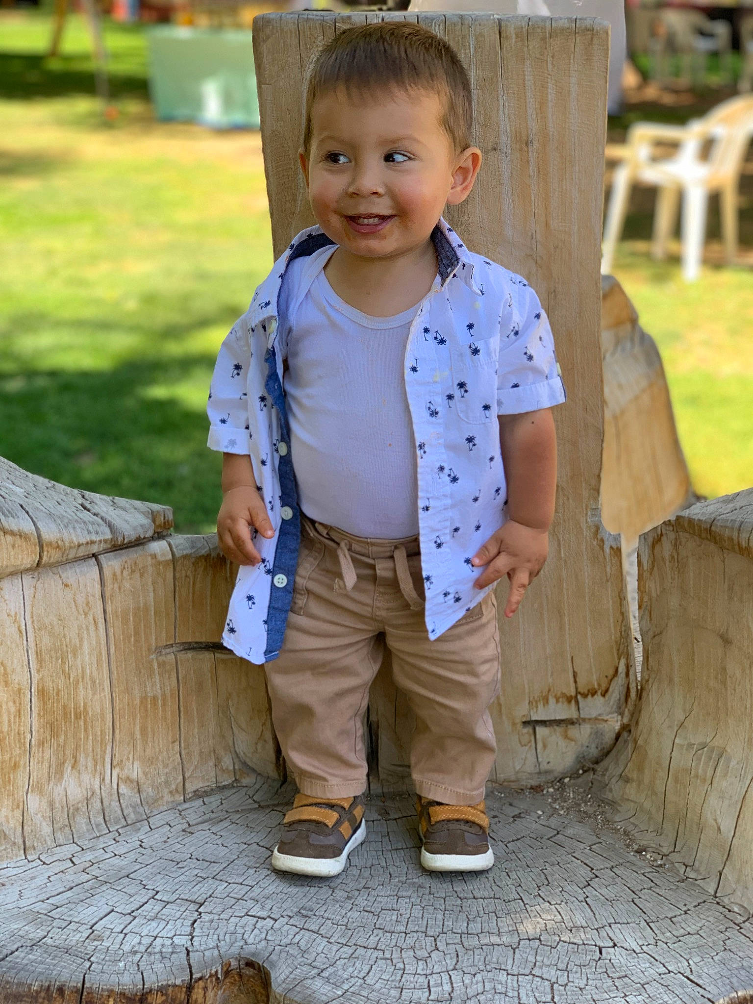 Eli is registered to the contest to win money with this photo: baby_toddler_clothing, child, denim, electric_blue, eye, face, fun, grass, green, hair, happy, joy, leisure, person, plant, skin, sleeve, smile, snapshot, toddler