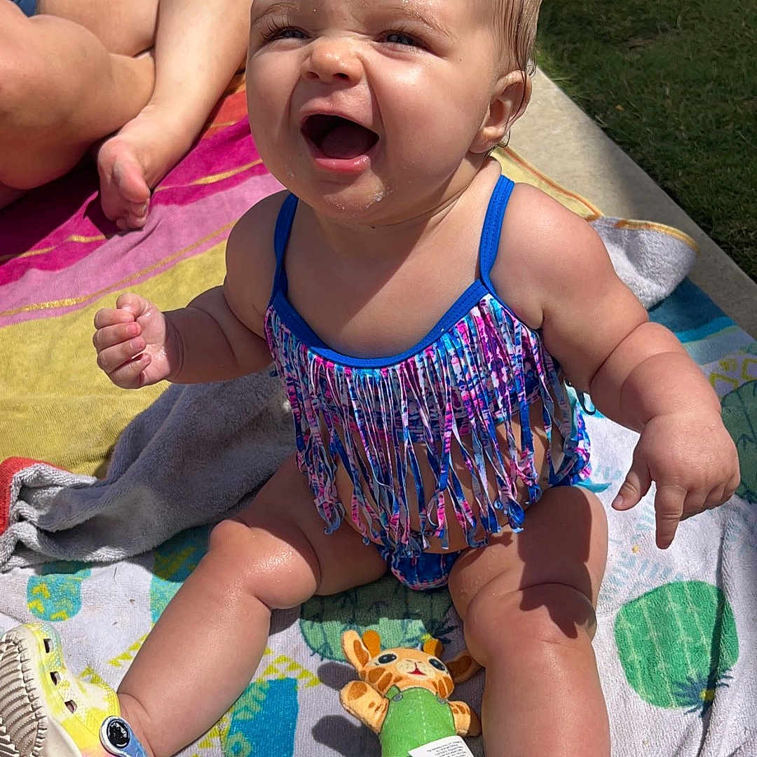 Estrella joined the competition — help win amazing prizes! baby, clothing, cream, dessert, face, footwear, grass, happy, head, nature, outdoors, park, person, photography, plant, portrait, shoe, shorts, summer, swimwear