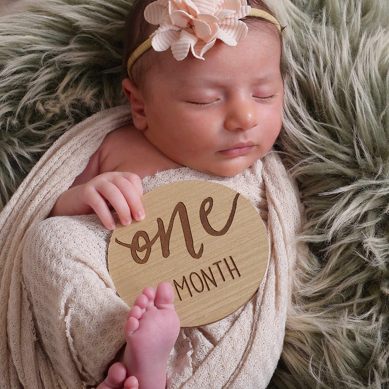 Isla joined the competition — help win amazing prizes! baby, blanket, cozy, cute, feet, flower, fur_rug, hand, headband, indoors, infant, newborn, one_month, peaceful, portrait, resting, sleeping, soft_texture, wooden_sign, wrapped