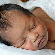 Makayla is registered to the contest to win money with this photo: baby, blanket, child, closeup, cute, face, head, infant, newborn, peace, peaceful, portrait, relaxation, rest, skin, sleep, sleeping, soft, toddler, young