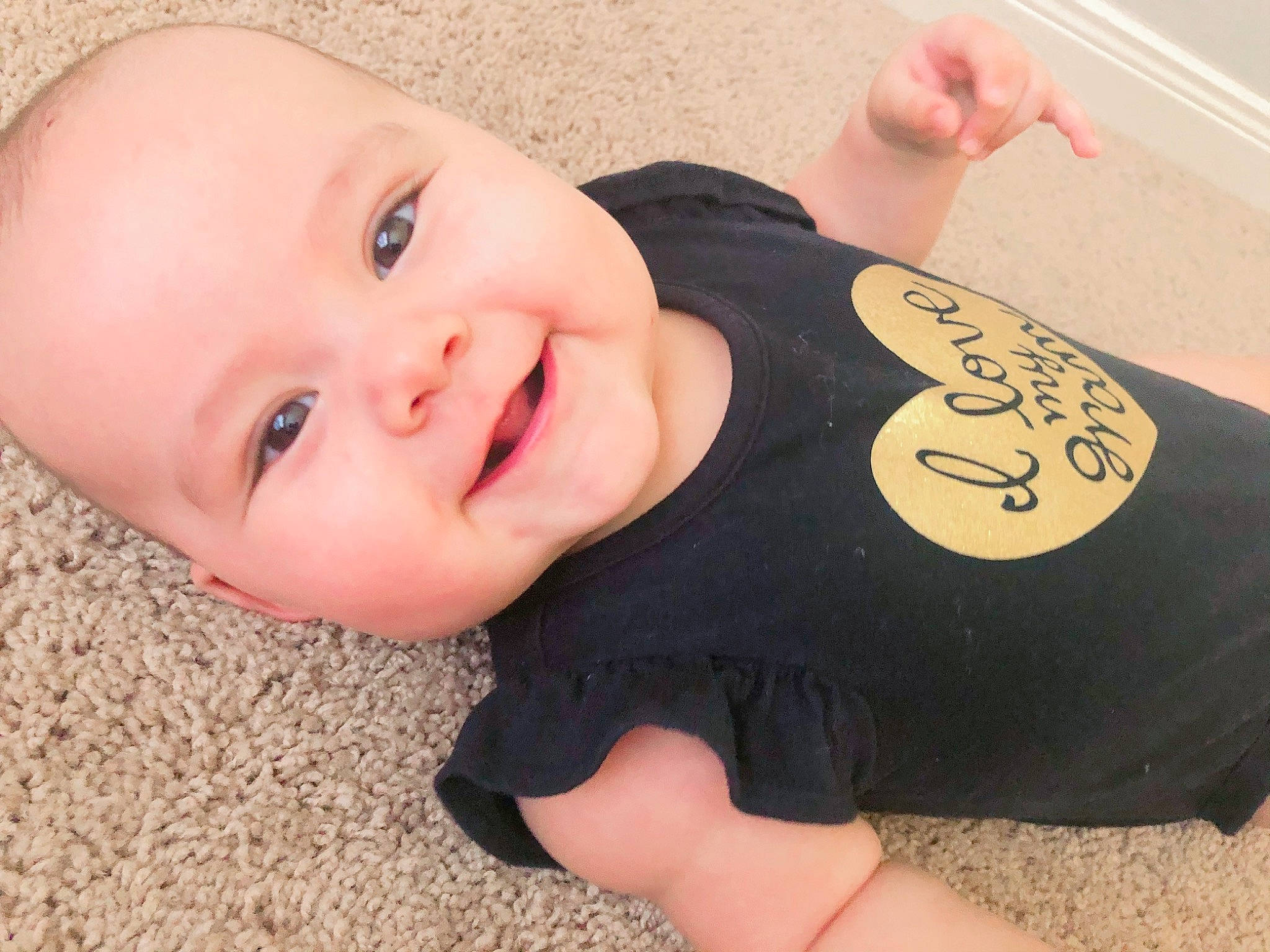 Juliet is registered to the contest to win money with this photo: arm, baby, baby_toddler_clothing, cheek, child, face, finger, hand, head, joint, joy, mouth, neck, nose, person, product, skin, thumb, toddler