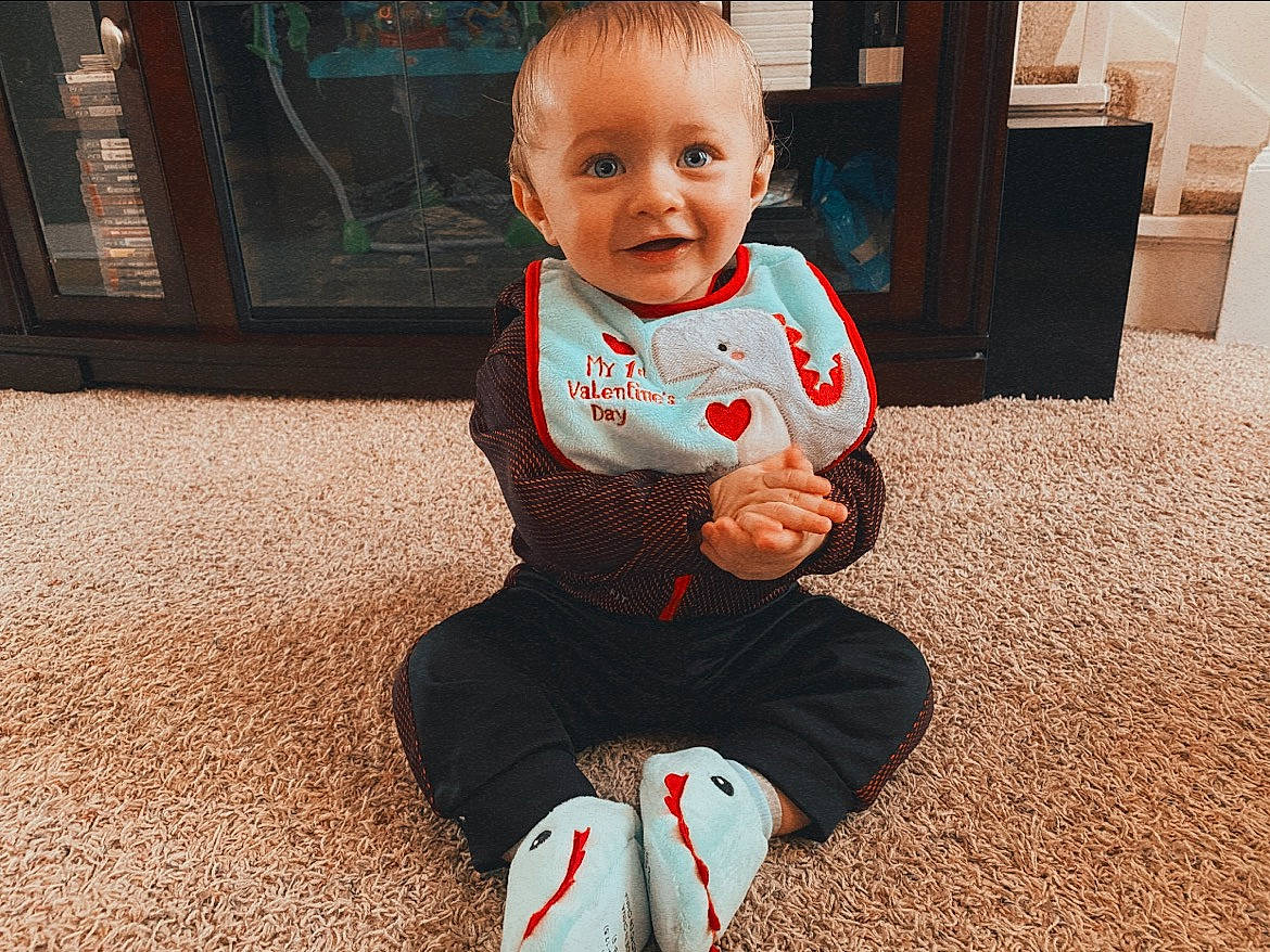 Jessiah is registered to the contest to win money with this photo: baby, baby_toddler_clothing, cheek, child, clothing, eye, finger, floor, flooring, fun, grass, hairstyle, happy, head, joy, leg, person, sleeve, smile, standing