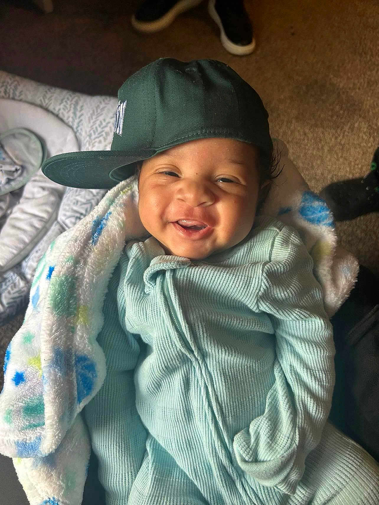 Yae is registered to the contest to win money with this photo: baby, babylaughing, baseballcap, boy, cap, child, clothing, coat, face, happy, hat, head, knitwear, laughing, male, person, photography, portrait, smile, sweater