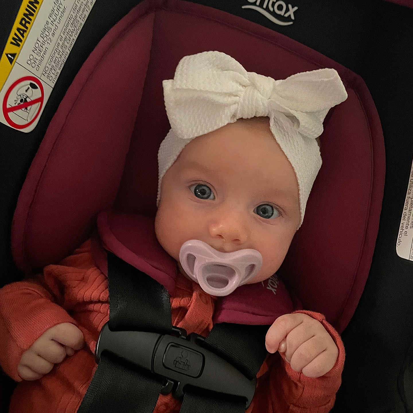 Athena joined the competition — help win amazing prizes! accessories, baby, bodypart, bonnet, cap, car, car_interior, carseat, clothing, cushion, face, finger, hand, hat, head, person, photography, portrait, transportation, vehicle