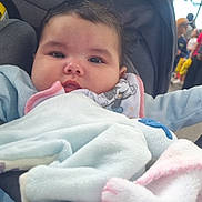 Djena participe au concours pour gagner de l'argent avec cette photo : baby, infant, child, blanket, stroller, outdoor, people, crowd, trees, clothing, warm, cute, face, expression, comfort, seated, portrait, daylight, soft, bundle