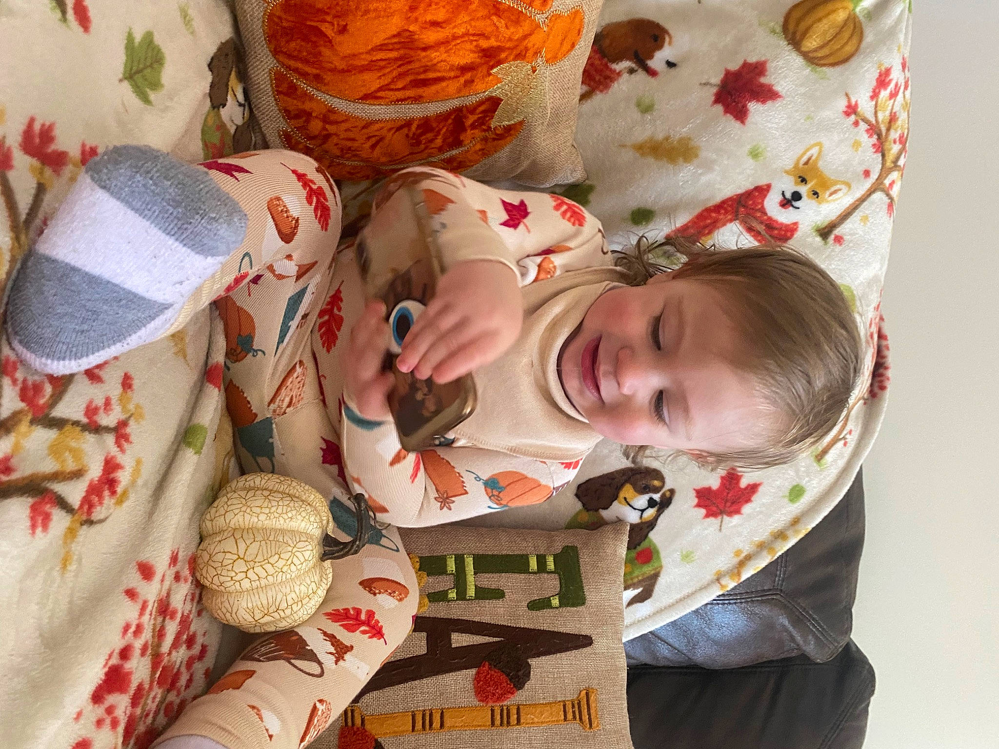 Emin is registered to the contest to win money with this photo: baby, baby_products, baby_toddler_clothing, child, comfort, happy, hat, linens, pattern, person, room, smile, textile, thread, toddler, wood