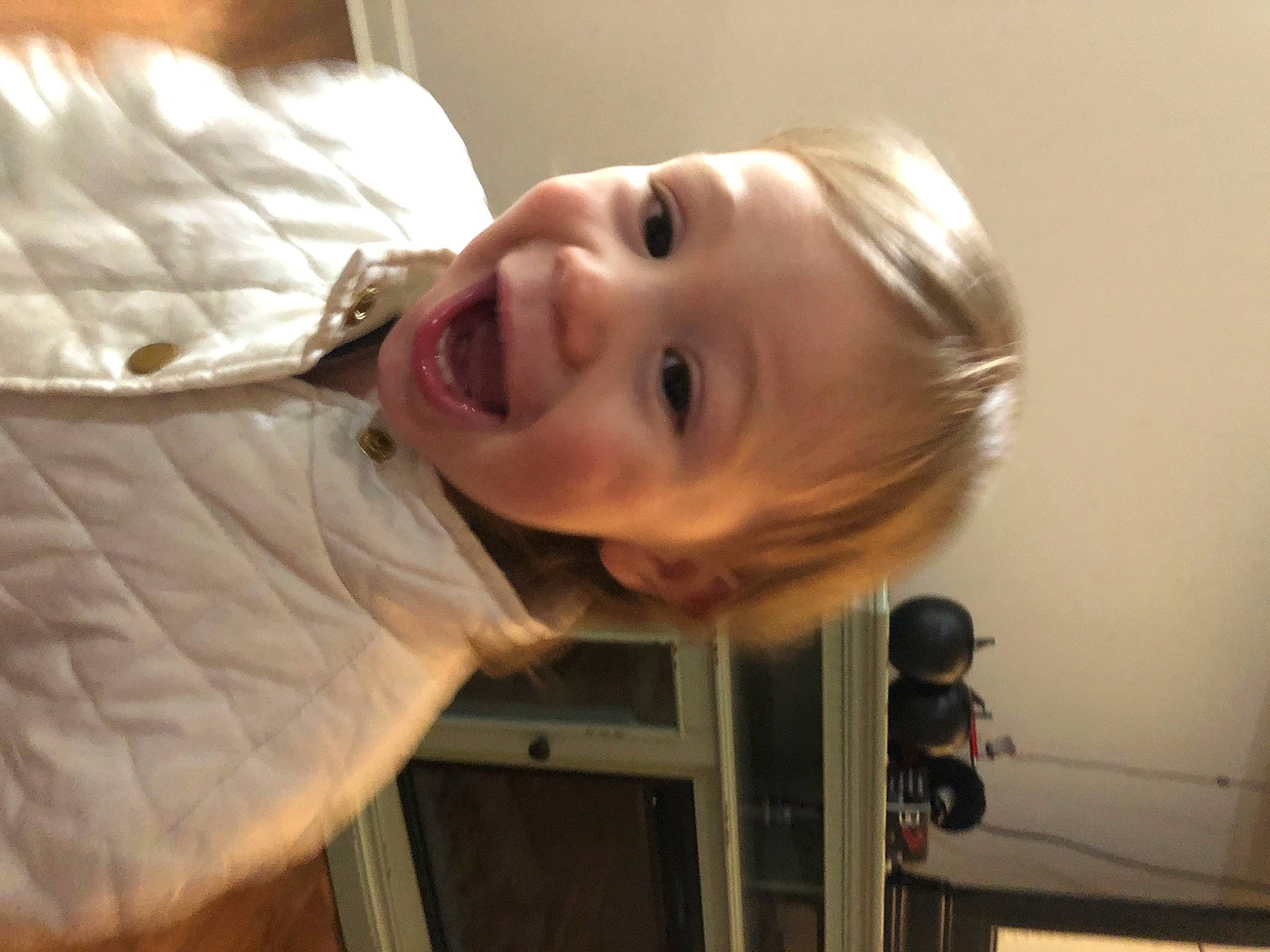 Emin is registered to the contest to win money with this photo: baby, baby_laughing, baby_toddler_clothing, cheek, child, comfort, dress_shirt, fun, happy, laugh, lip, mouth, nose, person, room, sleeve, smile, toddler, tooth, wood