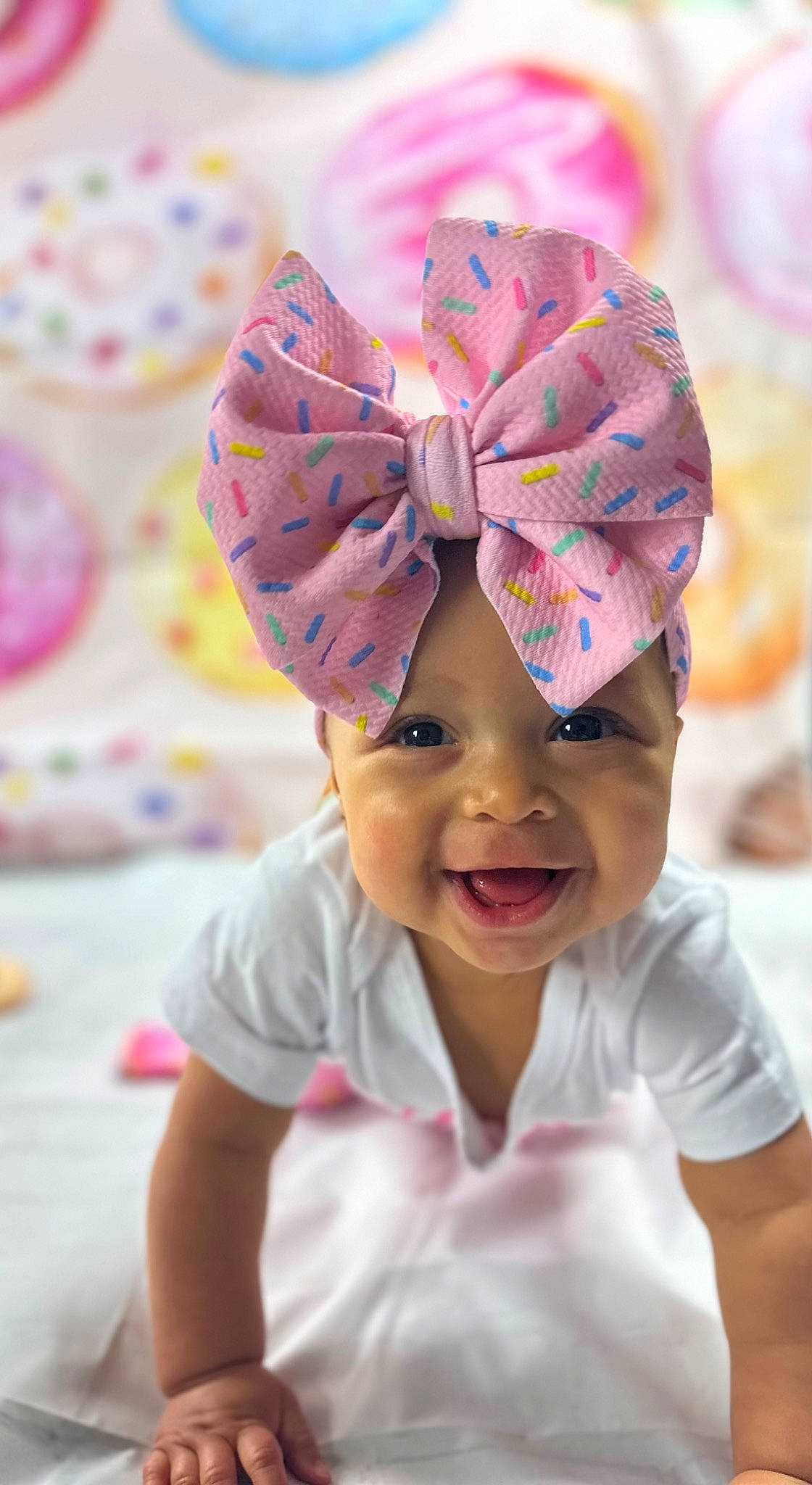 Zylah joined the competition — help win amazing prizes! baby, baby_toddler_clothing, cap, child, face, fashion_accessory, fun, hair_accessory, happy, headgear, headwear, leisure, magenta, person, pink, play, portrait_photography, purple, smile, toddler