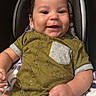Dylan joined the competition — help win amazing prizes! baby, child, smiling, onesie, green_clothing, car_seat, blanket, patterned_blanket, happy, infant, cute, portrait, indoor, seat, clothing, baby_garment, young_child, face, person, baby_boy