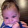 Dylan joined the competition — help win amazing prizes! baby, blue_shirt, chewing, child, closeup, cute, expression, eyes, face, food, hand, indoor, infant, mouth, person, portrait, skin, supporting_hand, tousled_hair, whale_design