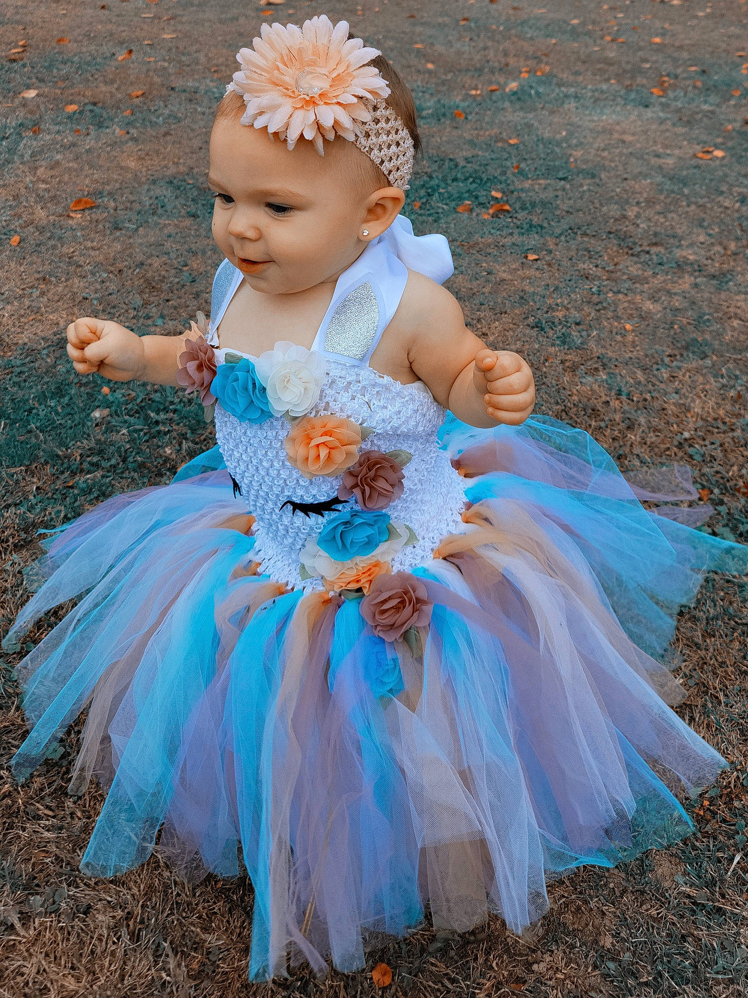 Jaylah joined the competition — help win amazing prizes! azure, baby, baby_toddler_clothing, beauty, bridal_accessory, dress, electric_blue, event, face, fashion_design, feather, gown, grass, happy, headgear, headpiece, iris, person, pink, toddler