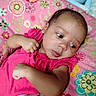 Jayla joined the competition — help win amazing prizes! baby, child, colorful, comfortable, cute, eyes, face, floral_pattern, head, indoors, infant, peaceful, pillow, pink_clothing, portrait, resting, skin, small_fists, soft, young