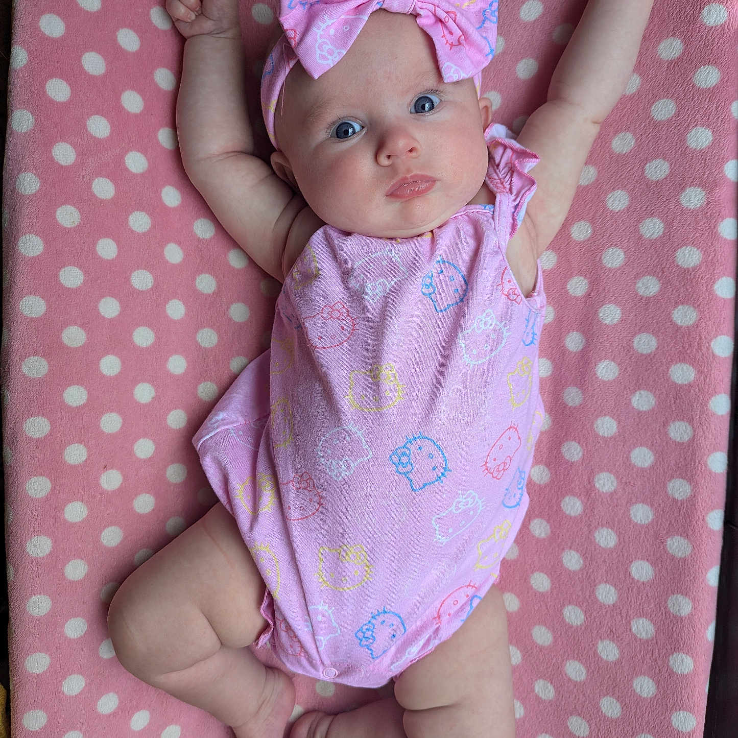 Isla is registered to the contest to win money with this photo: accessories, applique, baby, bed, bodypart, clothing, couch, dress, face, finger, formalwear, furniture, hat, head, homedecor, newborn, pattern, person, photography, portrait