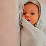 baby, infant, wrapped, towel, blanket, face, eyes, mouth, skin, soft, cozy, cute, newborn, child, indoors, resting, comfort, fabric, texture, lying_down