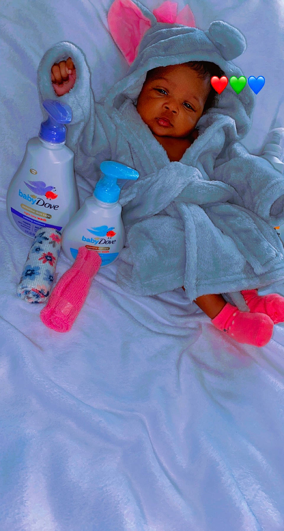 Reign joined the competition — help win amazing prizes! baby, baby_products, baby_sleeping, baby_toddler_clothing, child, comfort, electric_blue, glove, linens, person, pink, plastic, plastic_bottle, product, red, sleeve, textile, toddler, water_bottle, white