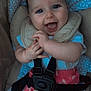 baby, infant, smiling, happy, car_seat, seatbelt, clothing, pink_pants, patterned, blue_shirt, hands, face, eyes, cute, child, indoor, safety, comfort, baby_girl, closeup