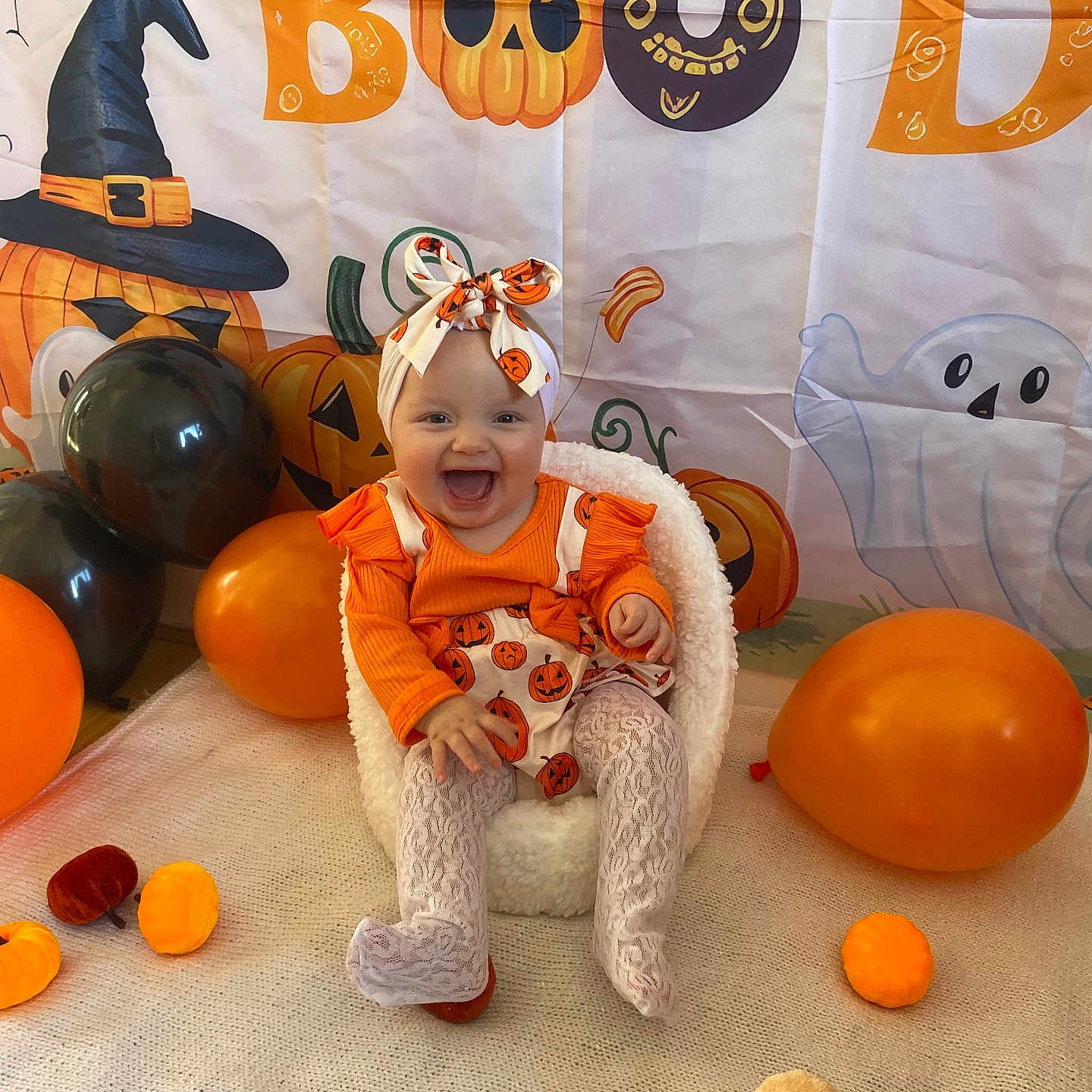 Brittany joined the competition — help win amazing prizes! baby, background, balloon, black, chair, child, costume, cute, decoration, festive, ghost, halloween, happy, headband, holiday, indoor, orange, pumpkin, smile, tights