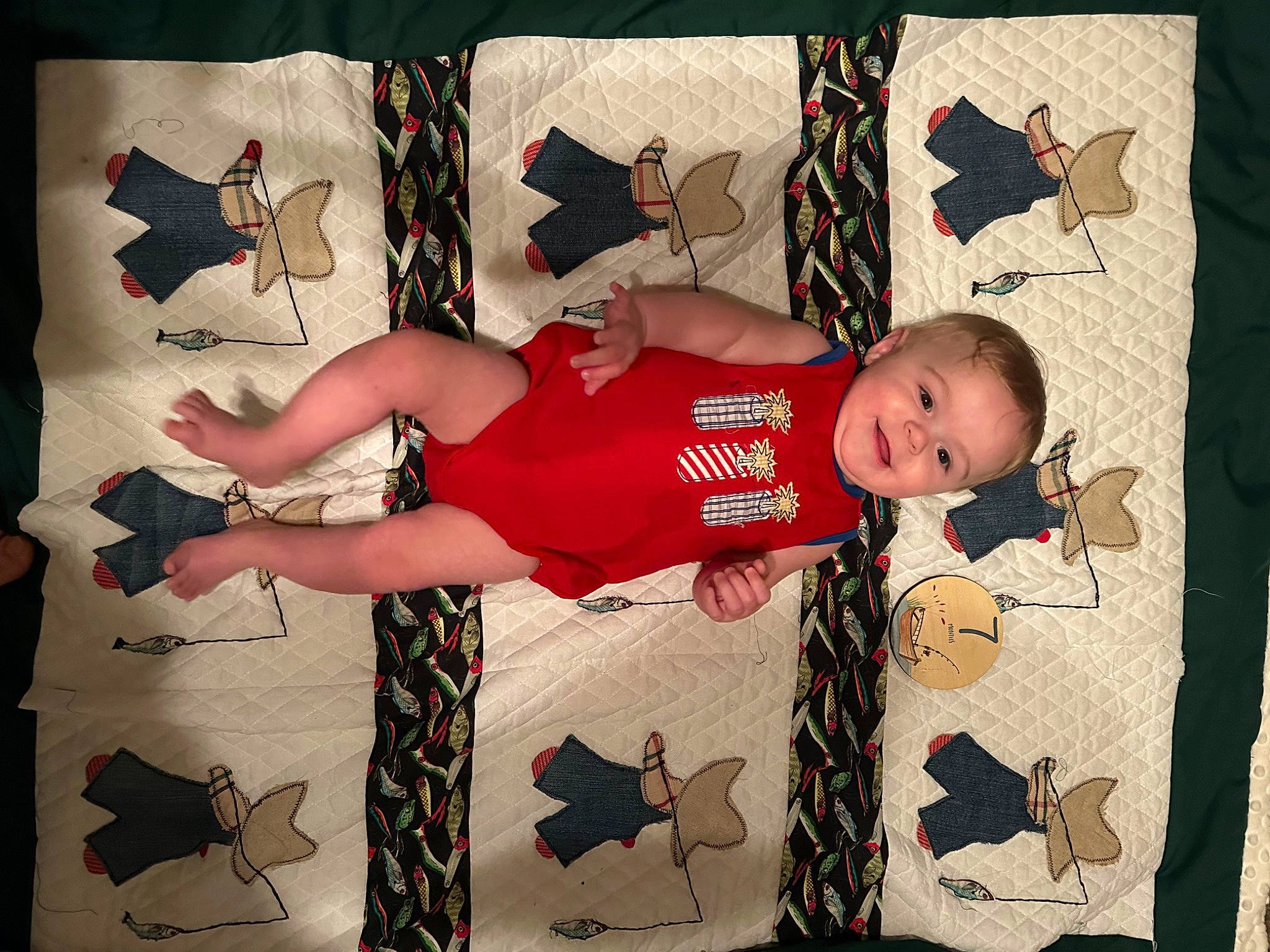 Motley joined the competition — help win amazing prizes! arm, baby, baby_toddler_clothing, carmine, child, comfort, flesh, fun, happy, human_leg, joy, knee, leg, linens, pattern, person, room, smile, snapshot, t_shirt