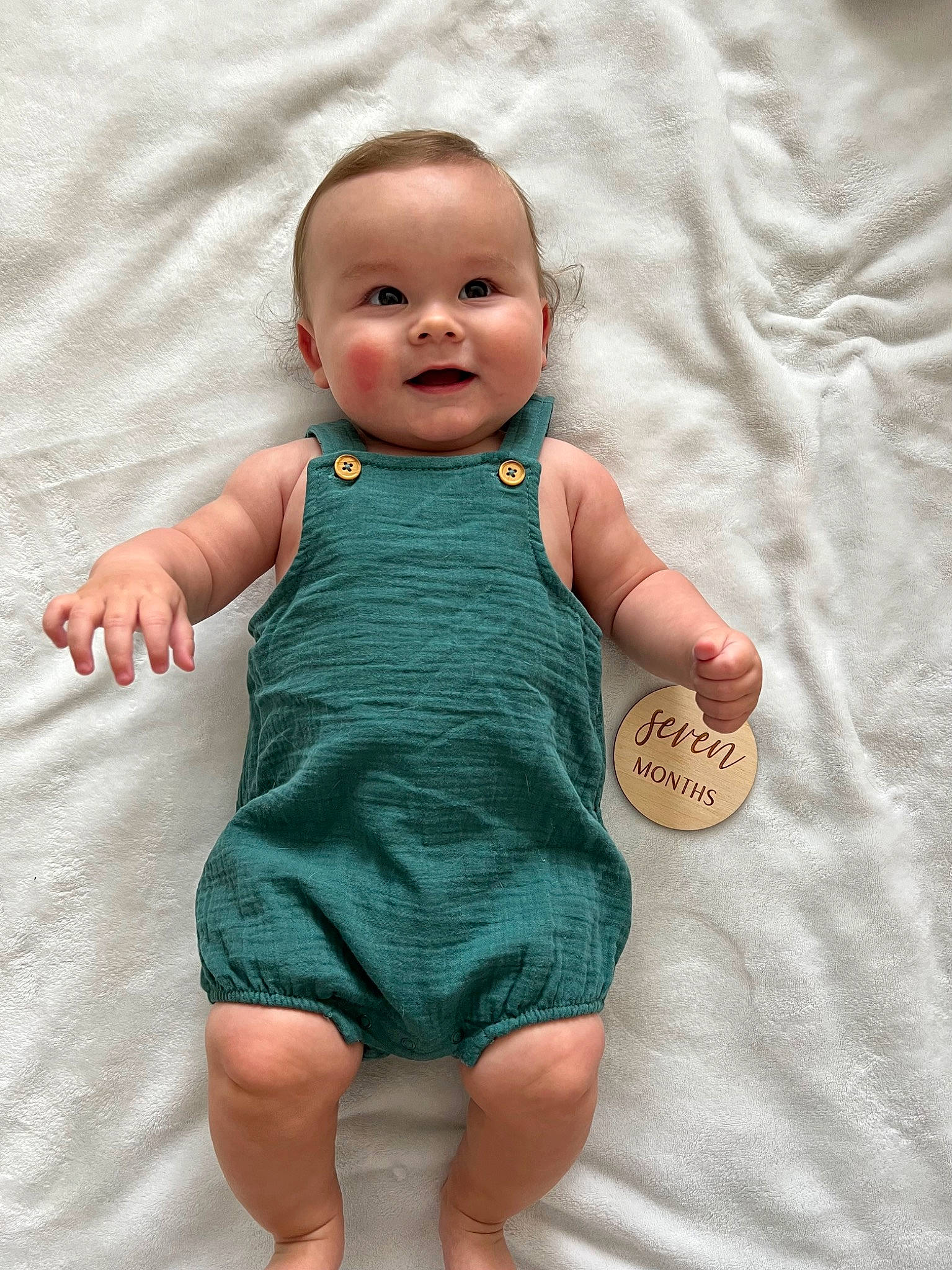 Greyson joined the competition — help win amazing prizes! baby, baby_toddler_clothing, cheek, child, finger, gesture, hand, happy, linens, nail, pattern, person, pink, skin, sleeve, smile, standing, textile, thumb, toddler