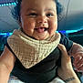 Victoria joined the competition — help win amazing prizes! baby, smiling, curly_hair, bib, polka_dot_pants, hand, indoor, child, cute, happy, face, person, clothing, infant, cheerful, portrait, holding, bright_lighting, background_lights, skin