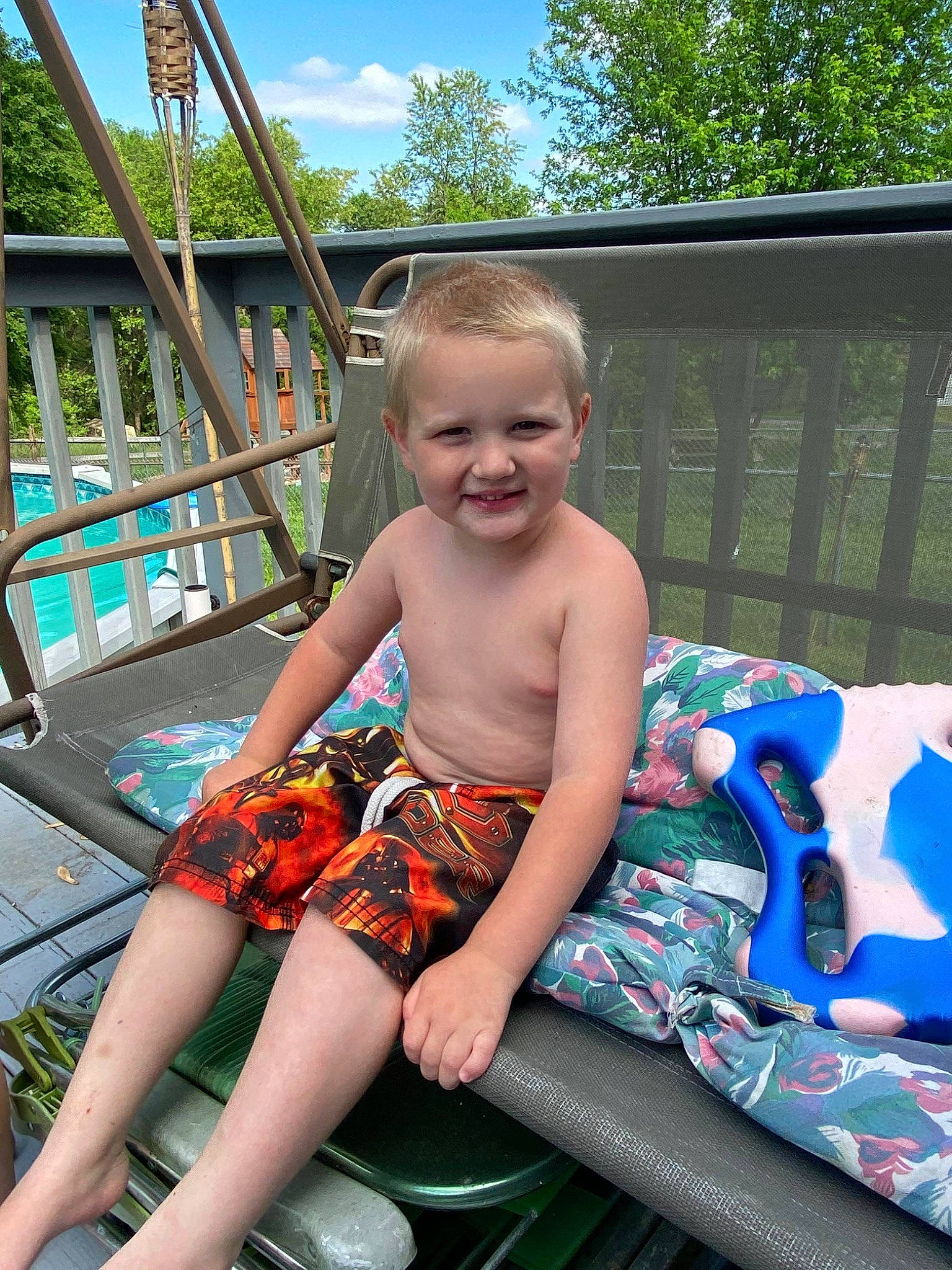 Conor is registered to the contest to win money with this photo: child, fawn, fun, joy, leisure, person, recreation, sitting, smile, summer, tree, vacation