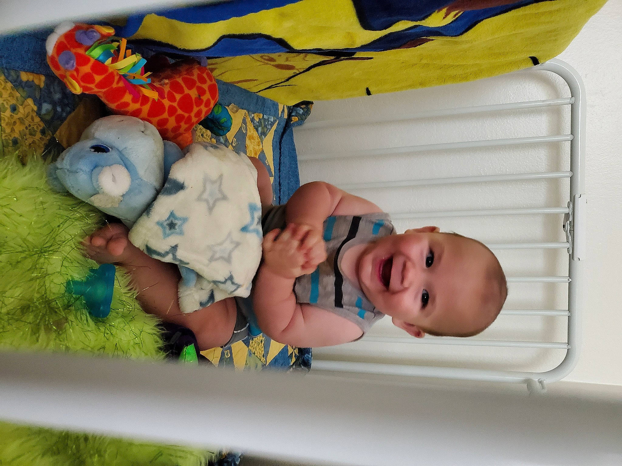 William is registered to the contest to win money with this photo: baby, baby_products, baby_sleeping, baby_toddler_clothing, baby_toys, bedtime, child, comfort, fun, happy, joy, linens, pattern, person, play, product, room, smile, textile, toddler