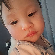 Yian joined the competition — help win amazing prizes! child, toddler, face, close_up, indoor, soft_lighting, expression, person, clothing, young, cute, portrait, baby, skin, head, eyes, hair, nose, mouth, warm_tone