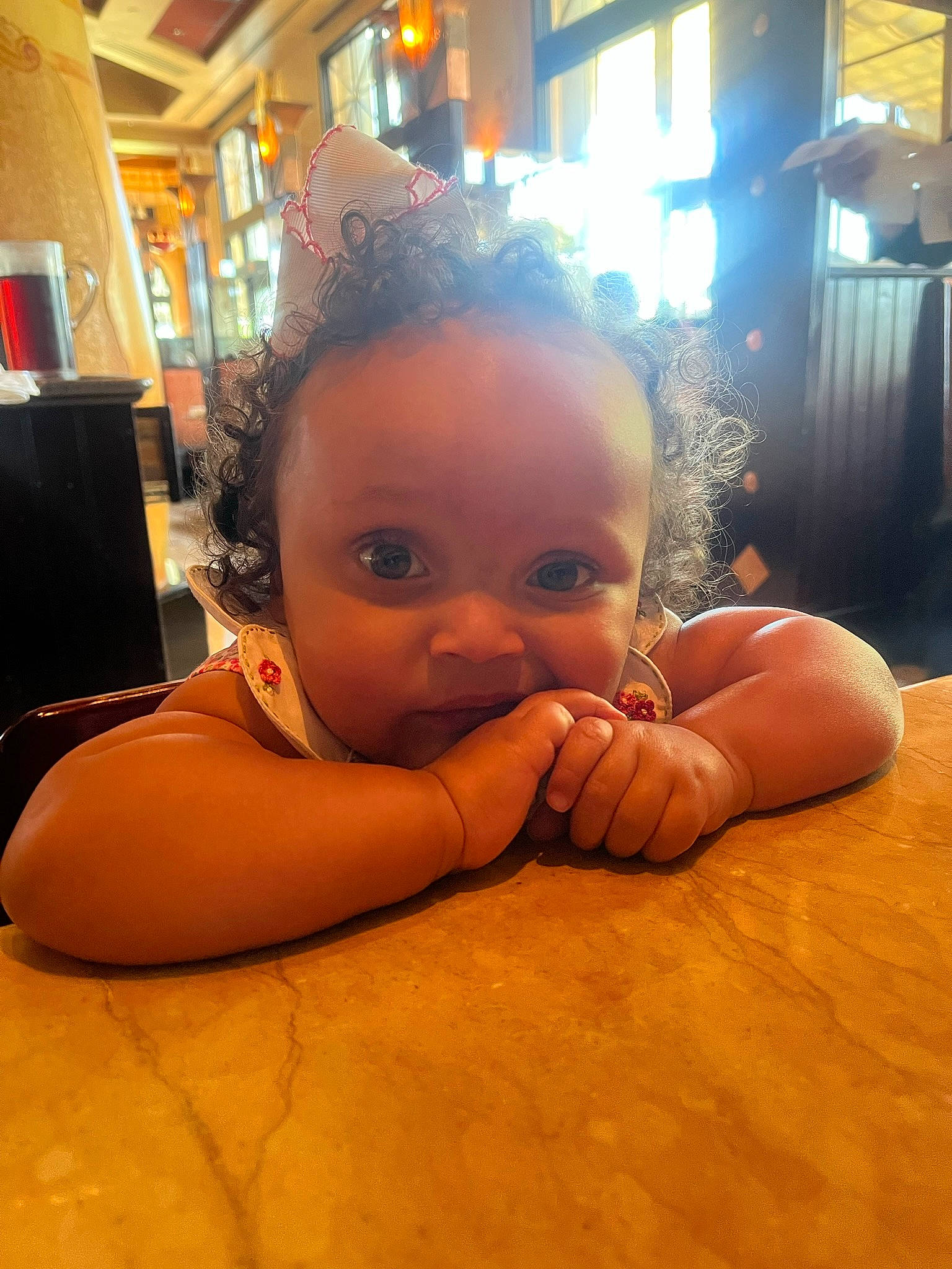 Julia is registered to the contest to win money with this photo: baby, black_hair, cheek, chest, cool, ear, eyebrow, eyelash, flooring, fun, gesture, happy, neck, nose, person, shoulder, skin, thumb, toddler, trunk