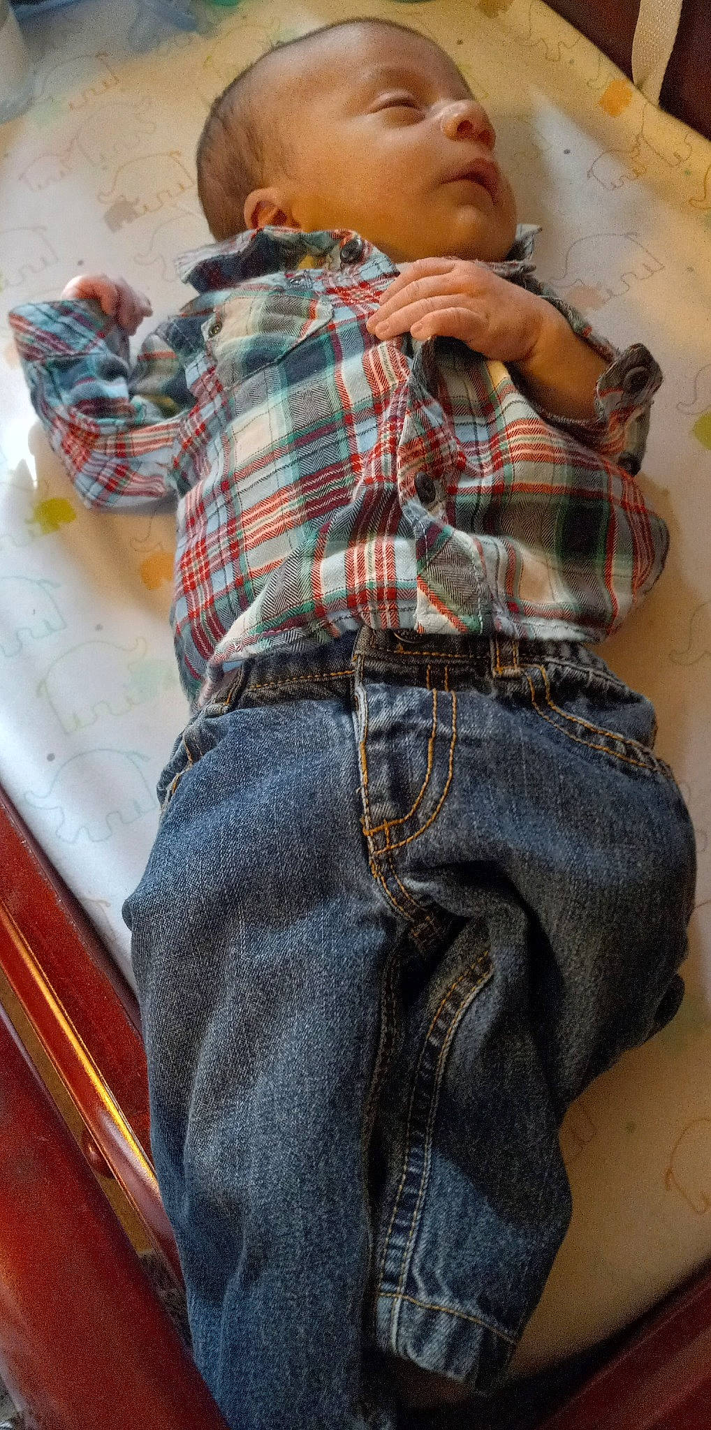 Carson is registered to the contest to win money with this photo: collar, denim, fashion, jeans, leg, orange, outerwear, person, photograph, plaid, shorts, sleeve, street_fashion, t_shirt, tartan, textile, thigh, trousers, waist, white