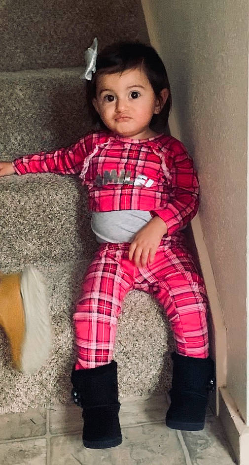 Bellatrix is registered to the contest to win money with this photo: baby, cheek, child, child_model, clothing, design, pattern, person, pink, plaid, product, sleeve, tartan, textile, tights, toddler