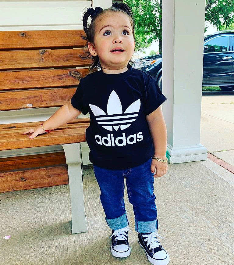 Abbigail is registered to the contest to win money with this photo: baby_toddler_clothing, blue, child, child_model, clothing, cool, design, fashion, footwear, long_sleeved_t_shirt, male, outerwear, person, product, sleeve, sports_uniform, sportswear, suit, surprise, t_shirt