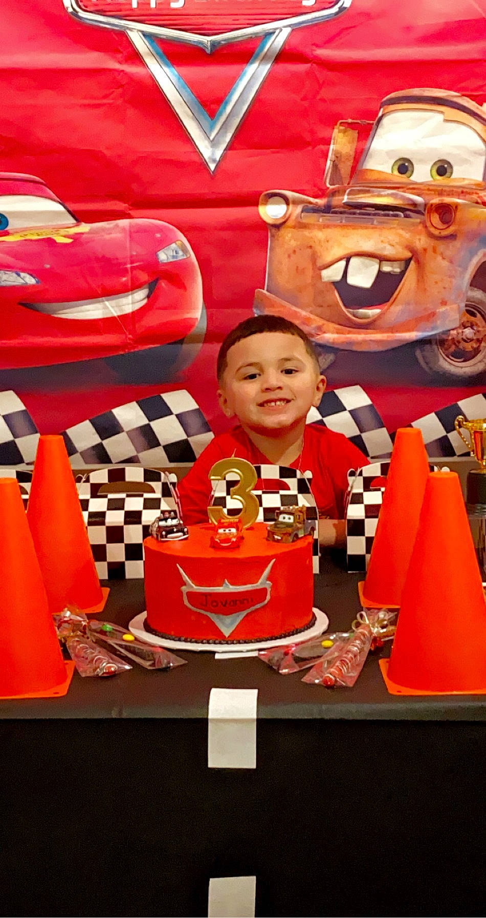 Jovanni joined the competition — help win amazing prizes! art, automotive_design, automotive_exterior, carmine, event, fictional_character, flag_of_the_united_states, flooring, fun, games, indoor_games_and_sports, joy, pattern, person, recreation, red, smile, suit, t_shirt, team