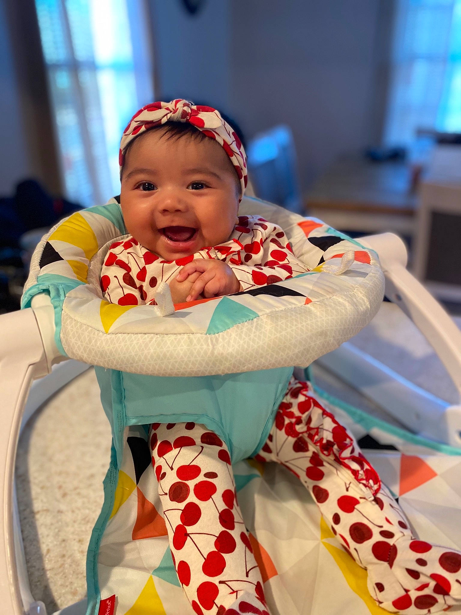 Catalina is registered to the contest to win money with this photo: baby, baby_toddler_clothing, cap, chair, child, costume, design, event, face, facial_expression, fun, happy, hat, headwear, holiday, leisure, pattern, person, recreation, sitting