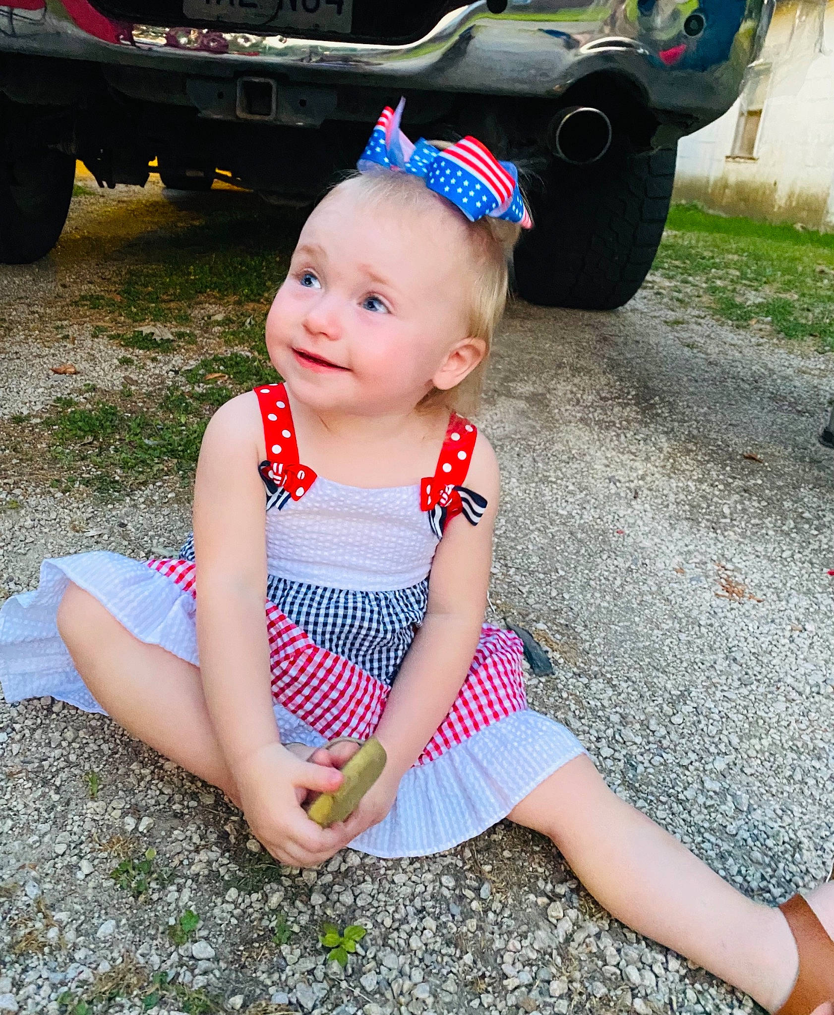 Hazley joined the competition — help win amazing prizes! automotive_exterior, automotive_lighting, automotive_tire, baby, baby_toddler_clothing, baseball_cap, cap, dress, grass, happy, hat, head, headgear, joy, light, person, pink, plant, smile, tire