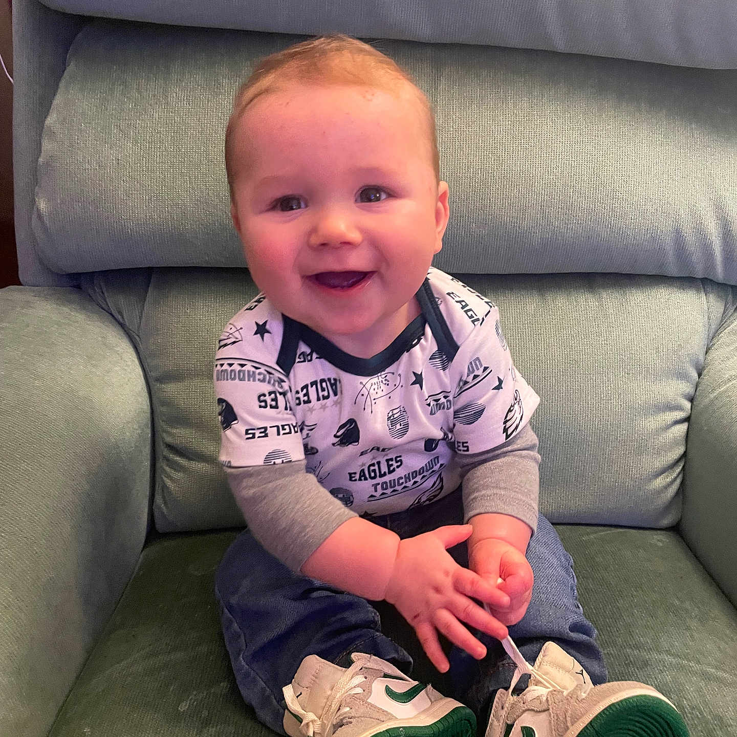 David Keith joined the competition — help win amazing prizes! architecture, baby, building, clothing, couch, cushion, face, footwear, furniture, head, homedecor, indoors, pants, person, photography, portrait, shoe, sitting, sneaker, t_shirt